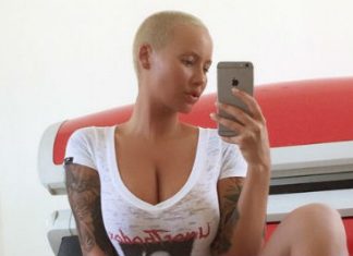Amber Rose aparece muito sensual de camisa decotada